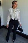 BLUSA VOLANTES PUNTOS CREMA